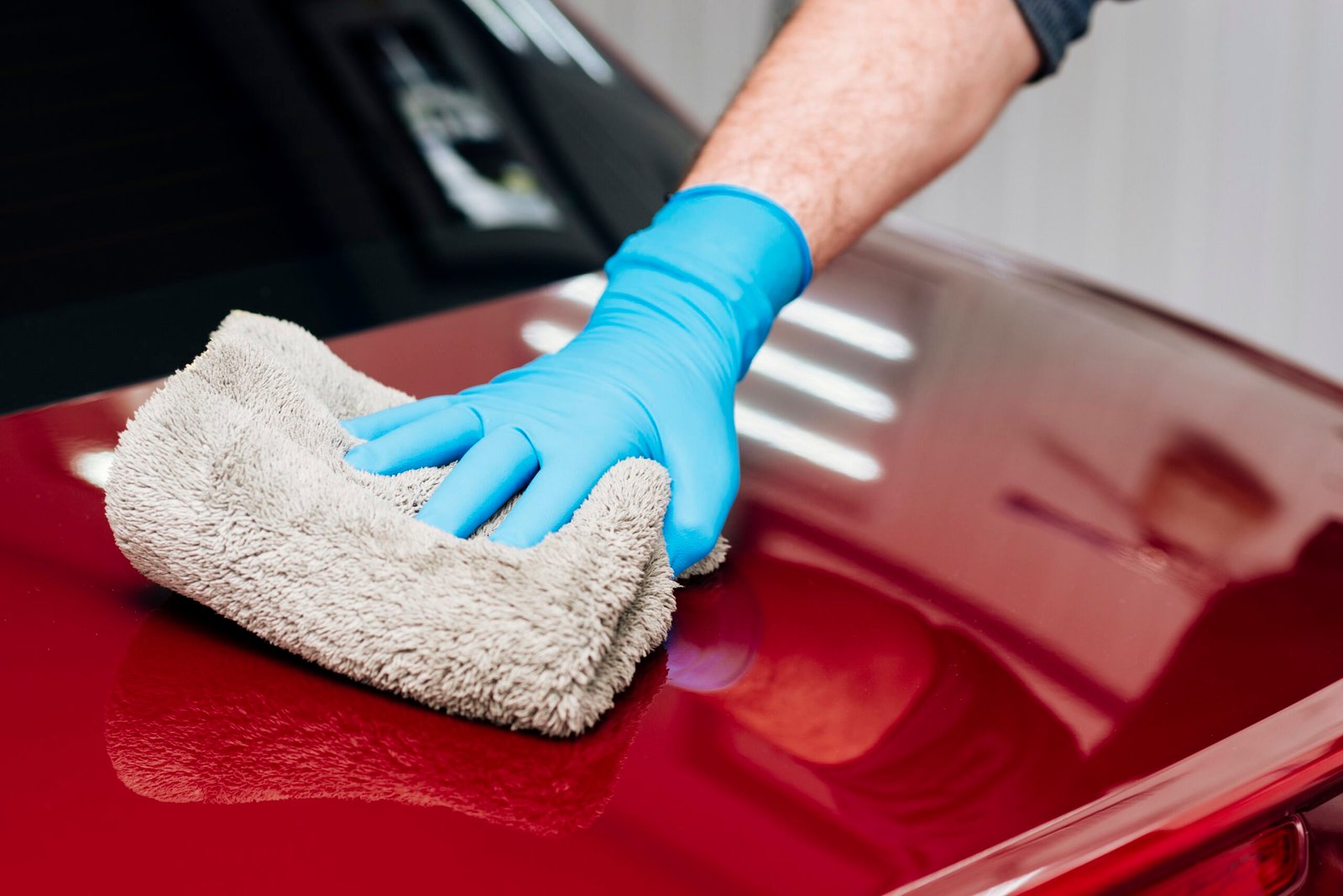 close-up-person-cleaning-car-exterior